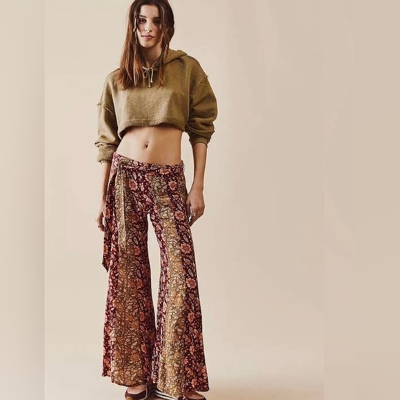 Free People Pants - NWOT! Free People Bali Boho flare pants. Color multi reds and greens. Sizes: M,L